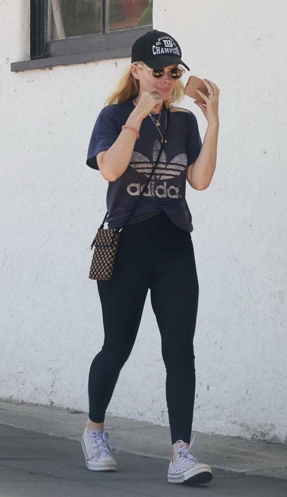 Kate Mara in a Black Cap