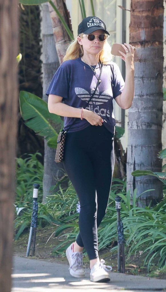 Kate Mara in a Black Cap