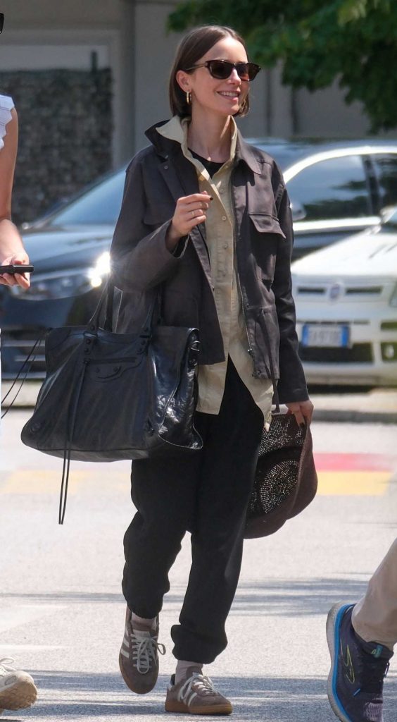 Lily Collins in a Black Sweatpants