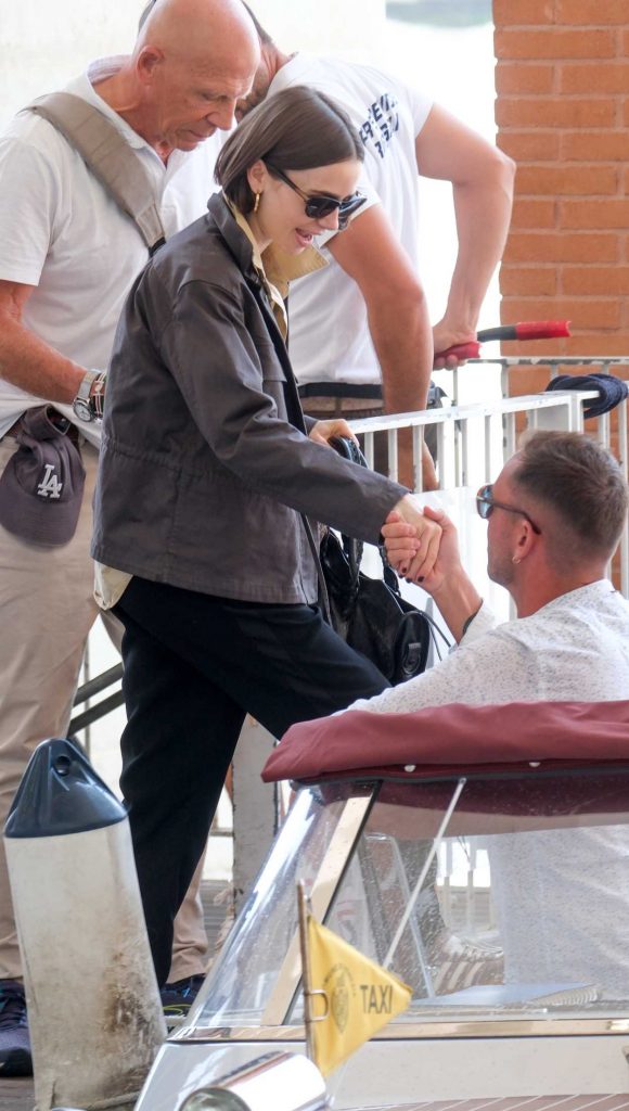 Lily Collins in a Black Sweatpants