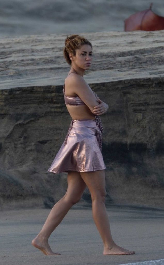 Shakira in a Metallic Pink Bikini