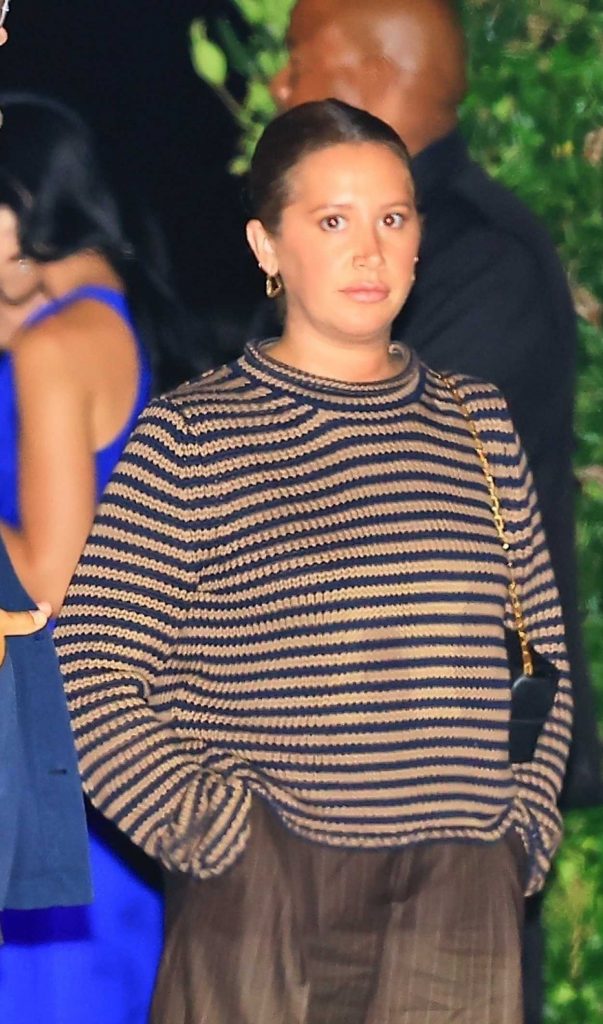 Ashley Tisdale in a Brown Pinstriped Pants