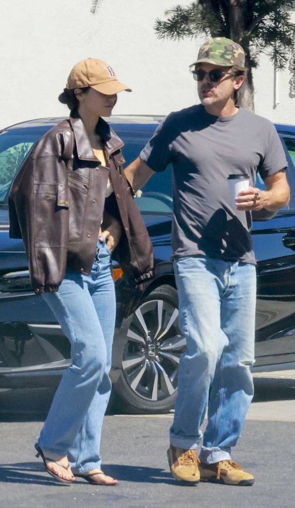 Caylee Cowan in a Brown Leather Jacket