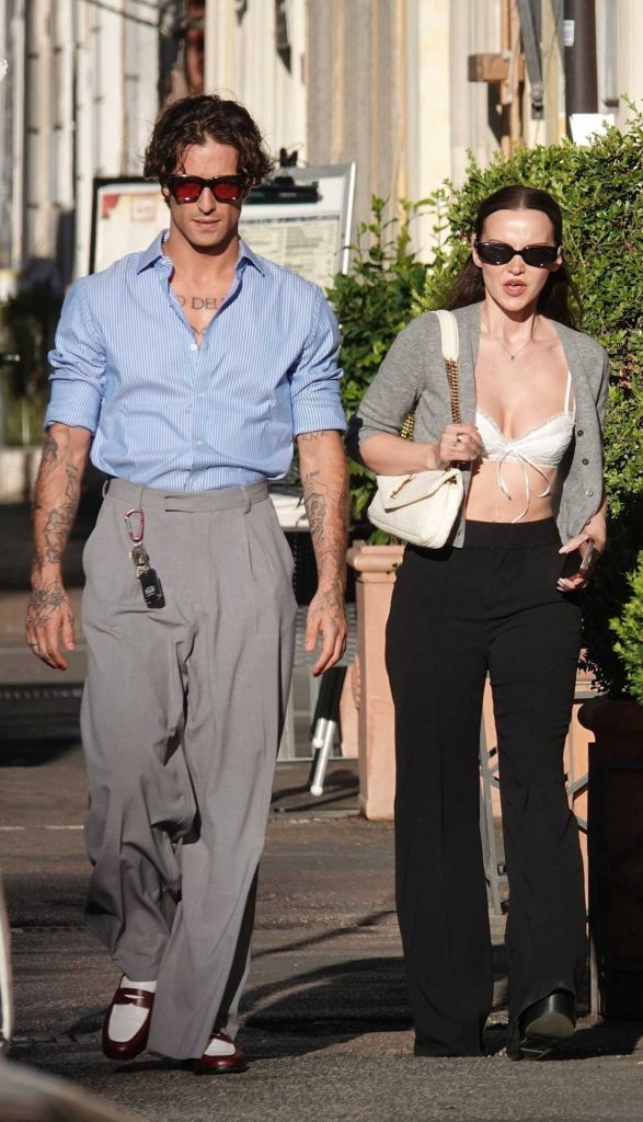 Dove Cameron in a Grey Cardigan