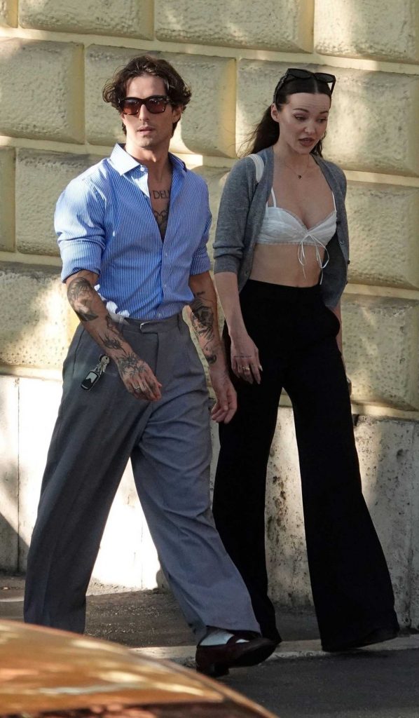 Dove Cameron in a Grey Cardigan