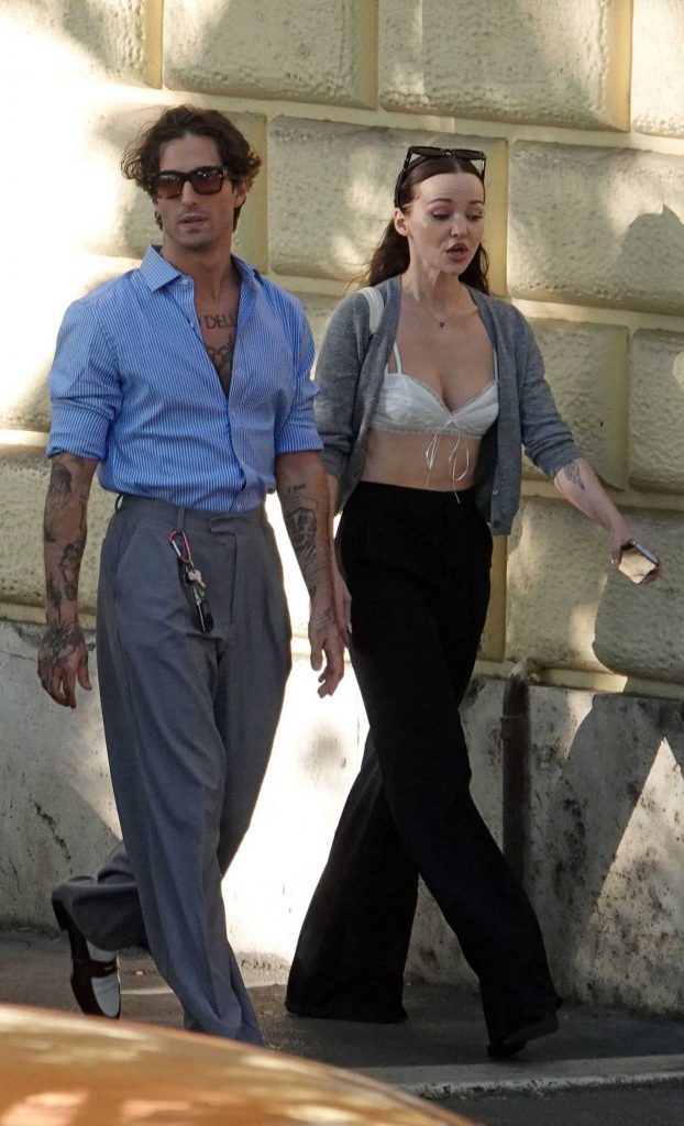 Dove Cameron in a Grey Cardigan