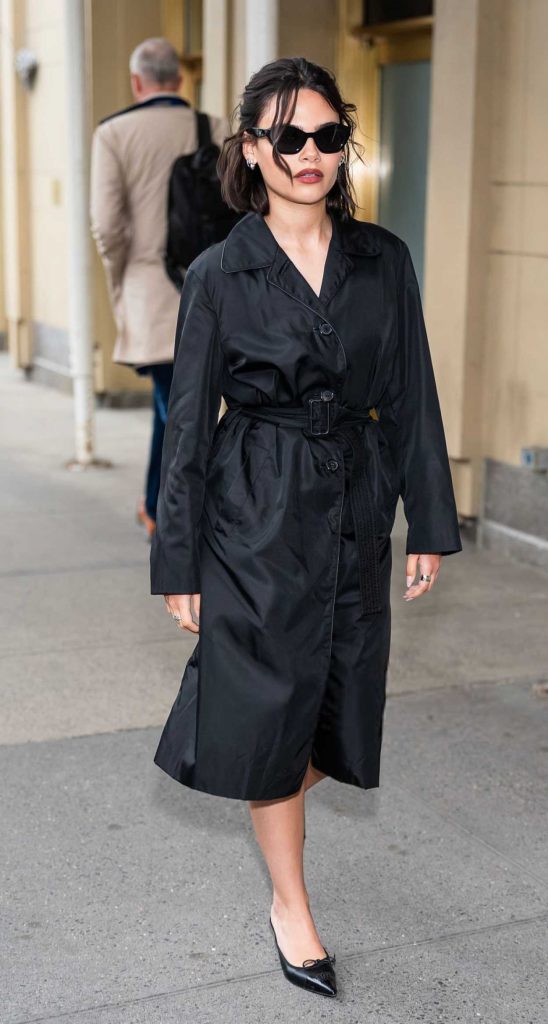 Ariana Greenblatt in a Black Trench Coat