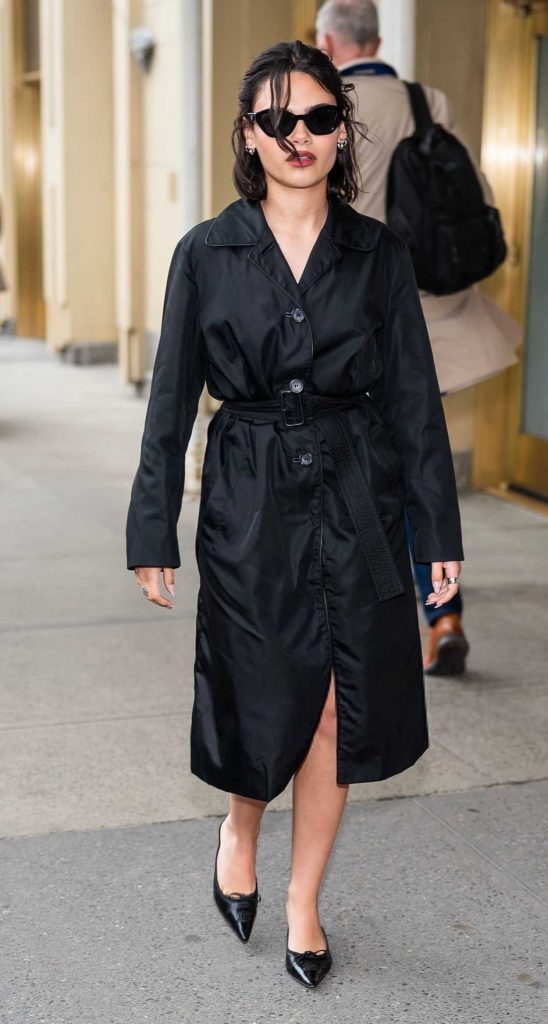 Ariana Greenblatt in a Black Trench Coat