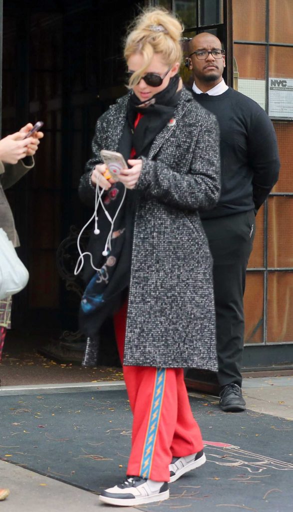 Kathryn Newton in a Grey Coat