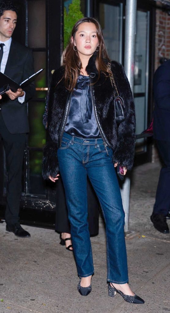 Lily Chee in a Black Fur Jacket