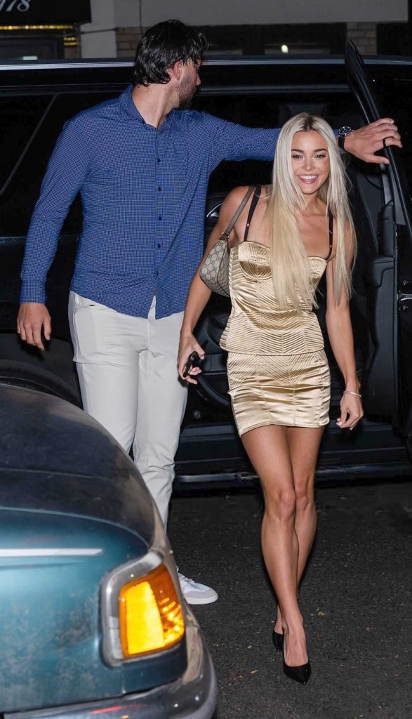 Olivia Dunne in a Gold Ensemble