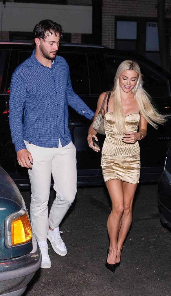 Olivia Dunne in a Gold Ensemble