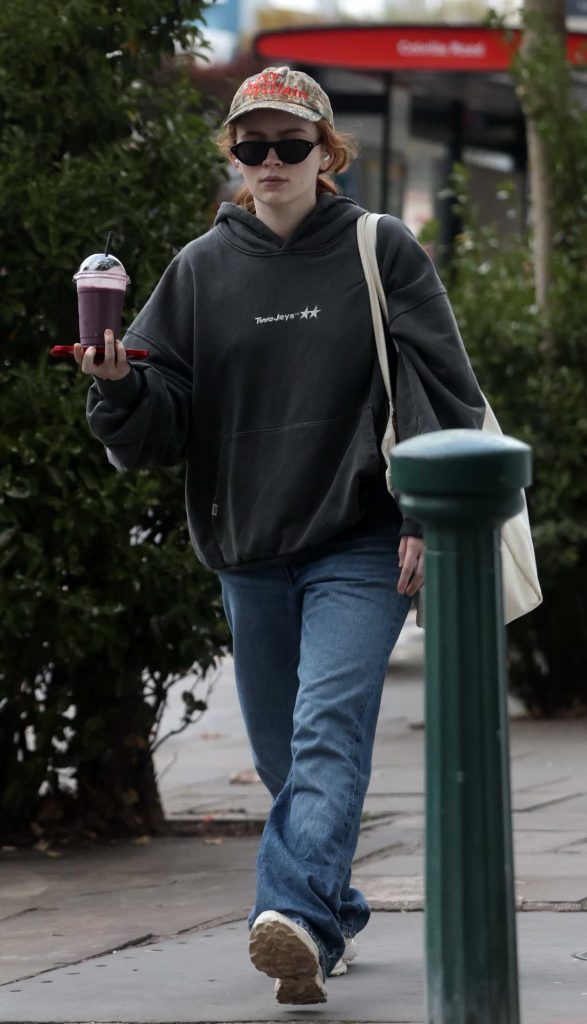 Sadie Sink in a Black Hoodie