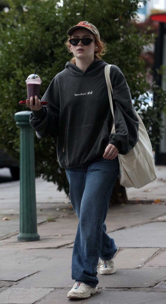 Sadie Sink in a Black Hoodie