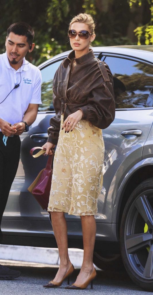 Bella Hadid in a Brown Leather Jacket