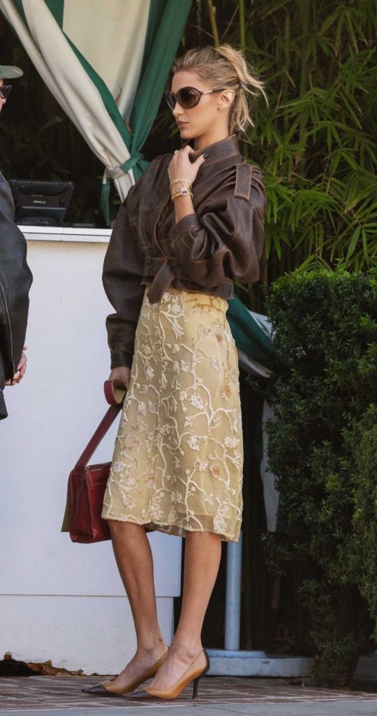 Bella Hadid in a Brown Leather Jacket