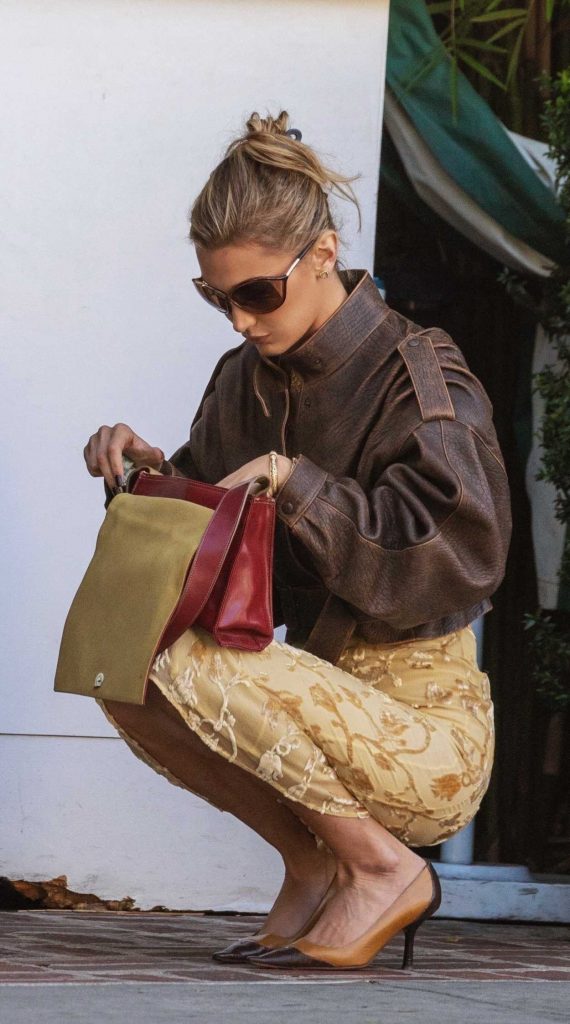 Bella Hadid in a Brown Leather Jacket