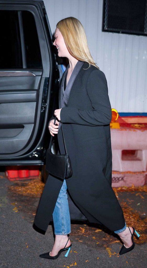 Elle Fanning in a Black Coat