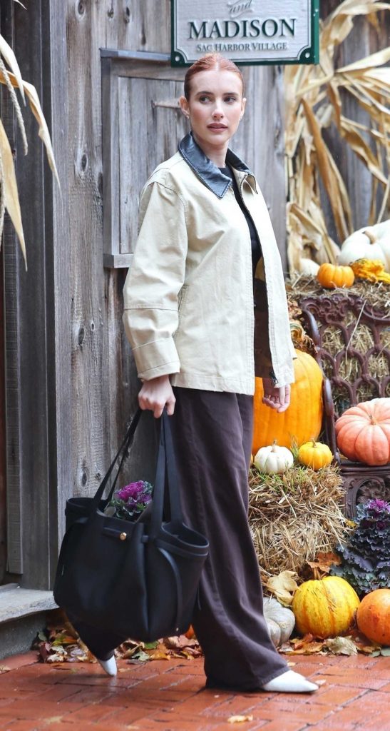 Emma Roberts in a Beige Jacket