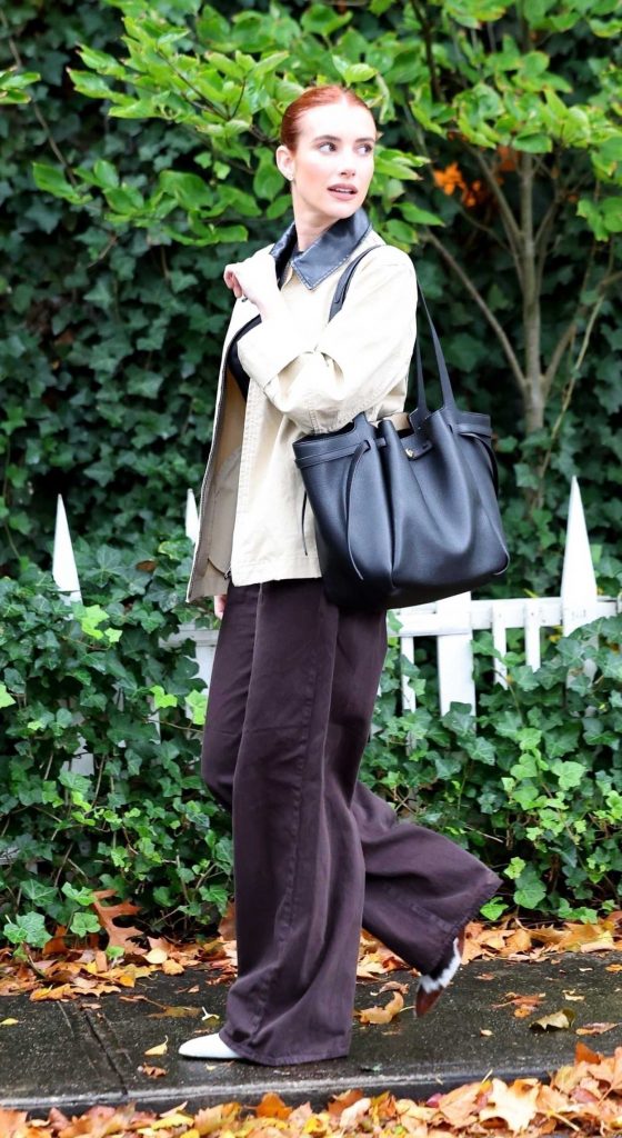 Emma Roberts in a Beige Jacket