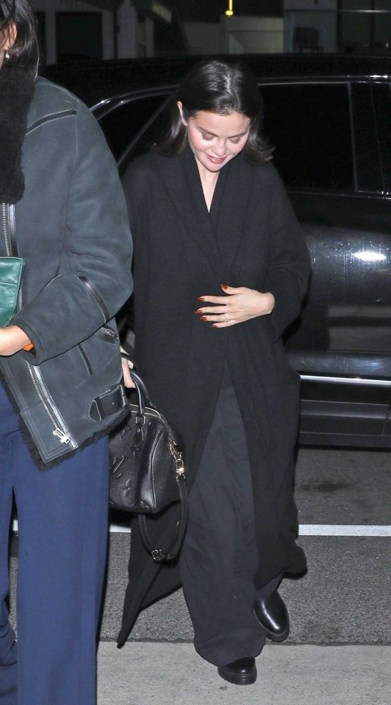 Selena Gomez in a Black Coat