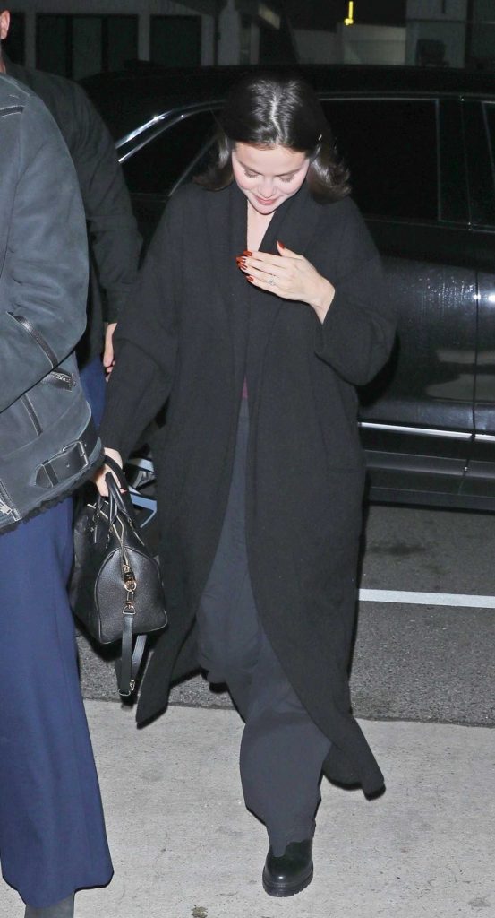 Selena Gomez in a Black Coat
