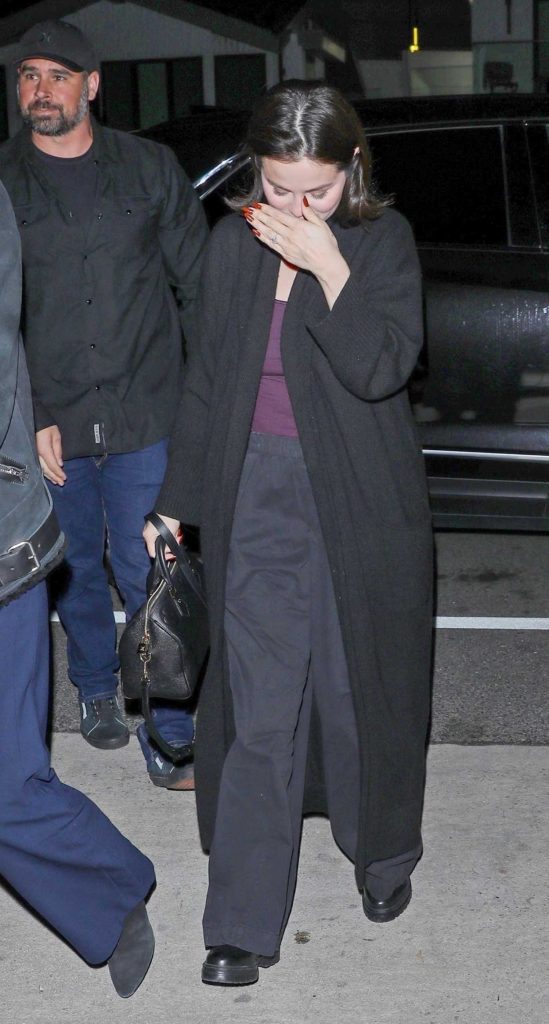 Selena Gomez in a Black Coat