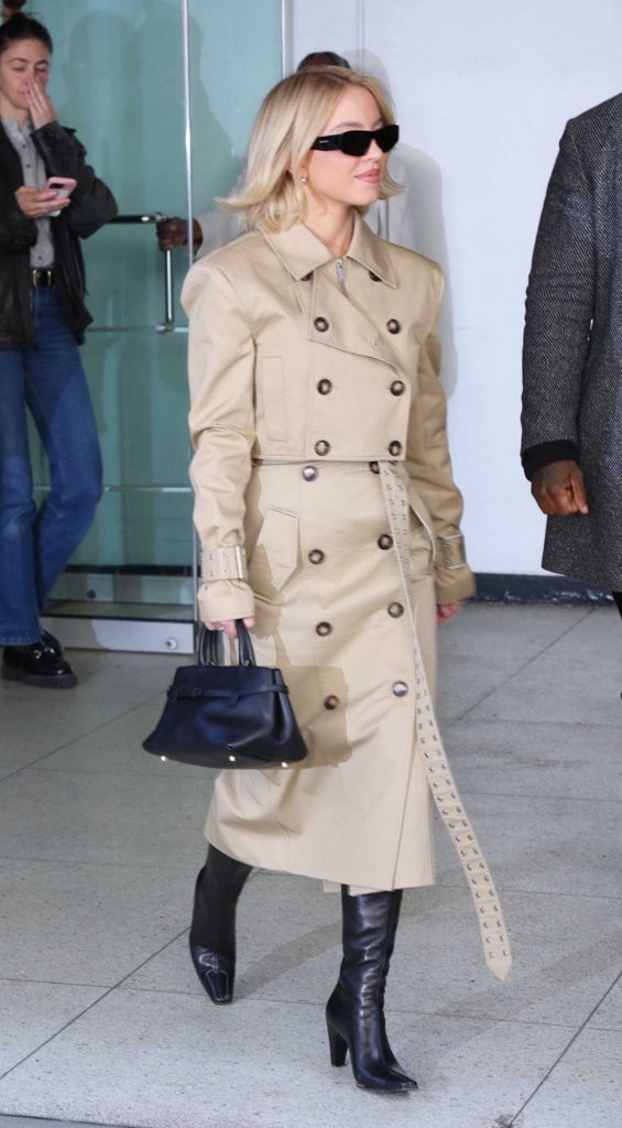 Sydney Sweeney in a Beige Trench Coat