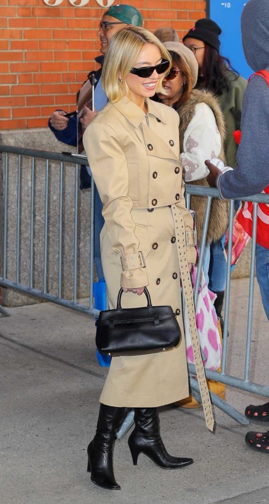 Sydney Sweeney in a Beige Trench Coat