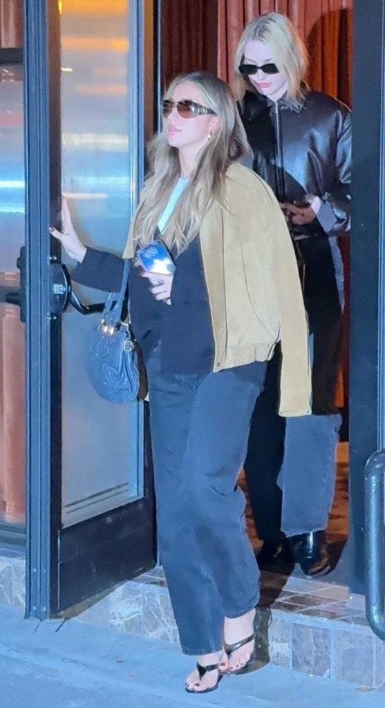 Tate McRae in a Yellow Jacket