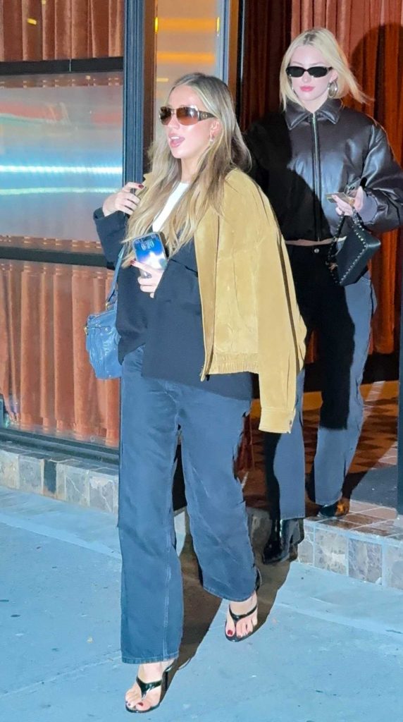 Tate McRae in a Yellow Jacket