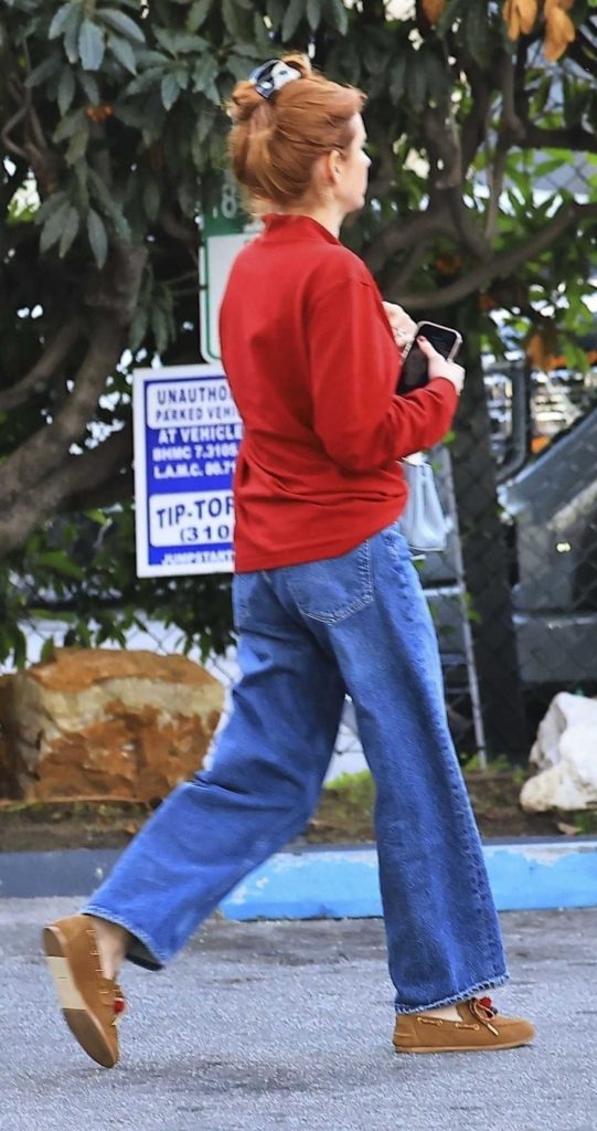 Emma Roberts in a Red Long Sleeves Polo