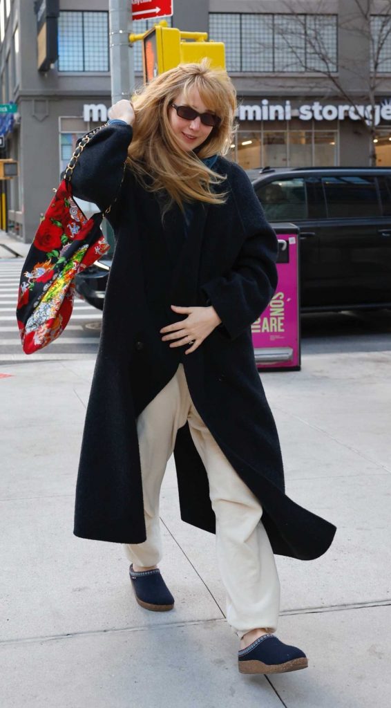 Jennifer Lawrence in a Black Coat