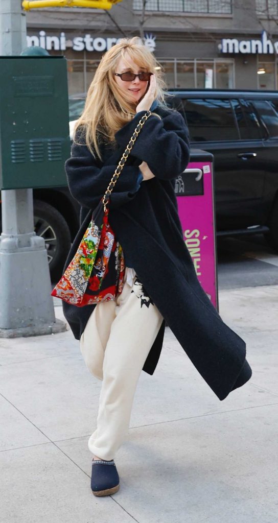 Jennifer Lawrence in a Black Coat