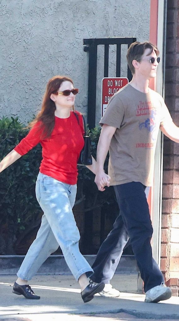 Joey King in a Red Long Sleeves T-Shirt