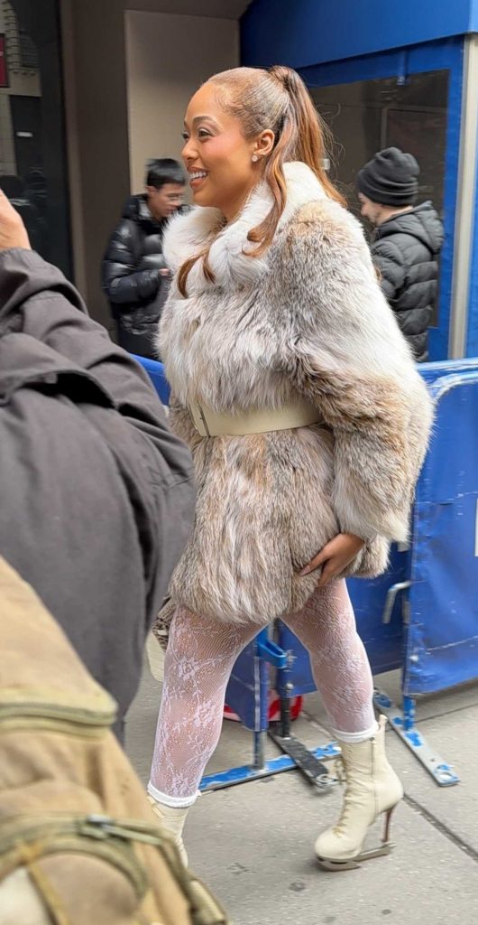 Jordyn Woods in a Beige Fur Coat