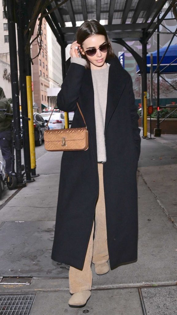 Lily Collins in a Black Coat