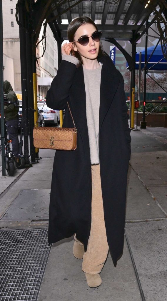Lily Collins in a Black Coat