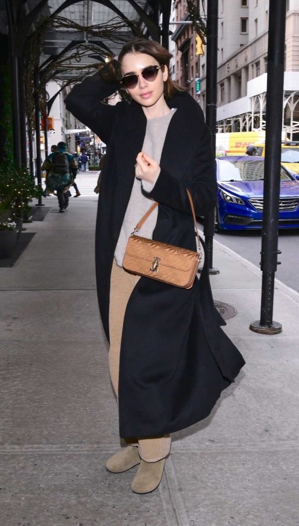 Lily Collins in a Black Coat