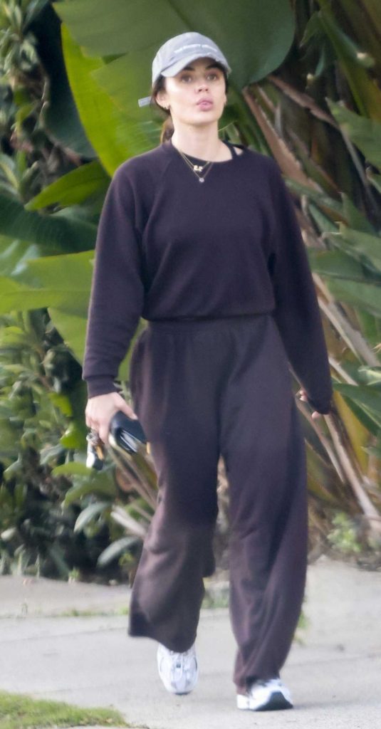 Lucy Hale in a Black Sweatsuit