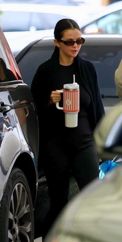 Selena Gomez in a Black Coat