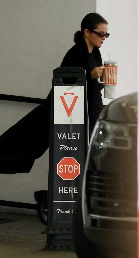 Selena Gomez in a Black Coat