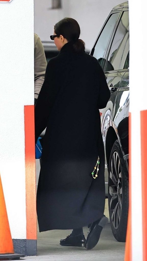 Selena Gomez in a Black Coat