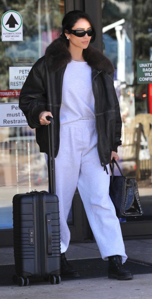 Shay Mitchell in a Black Leather Jacket