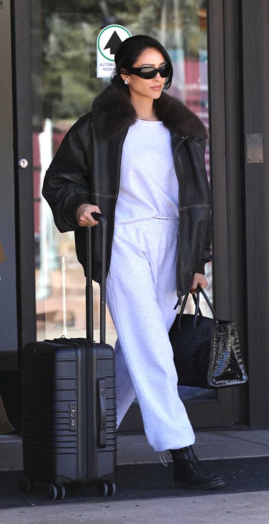 Shay Mitchell in a Black Leather Jacket