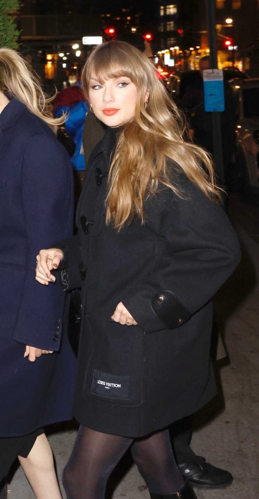 Taylor Swift in a Black Coat