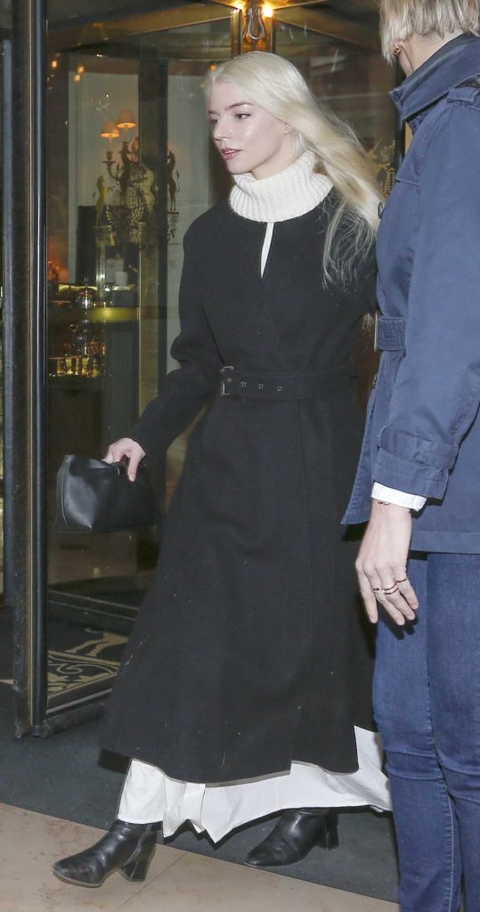Anya Taylor-Joy in a Black Coat