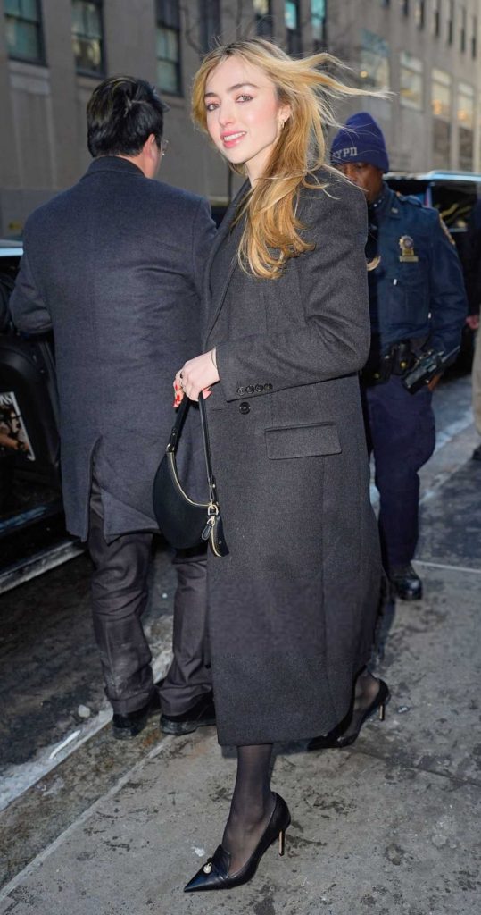 Peyton List in a Black Coat