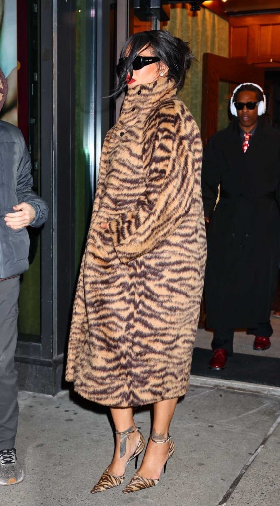 Rihanna in a Tan Animal Print Fur Coat