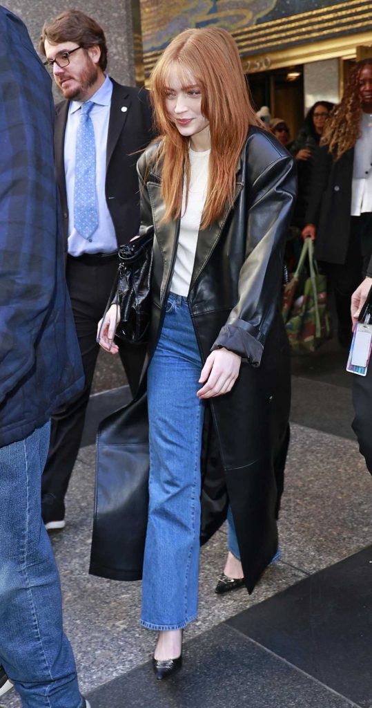 Sadie Sink in a Black Leather Coat